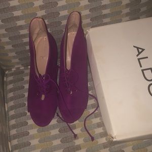 Purple heeled booties